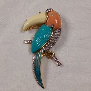 KJL ? Rhinestone/enamel/thermoplastic tropical bird brooch